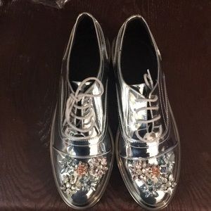 Silver embellished shoes